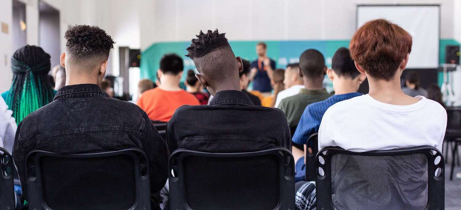 Students with chronic pain sitting in class at their school