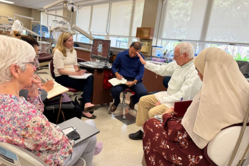 Geriatric Dentistry students and faculty listening to Dr. Clark speak.