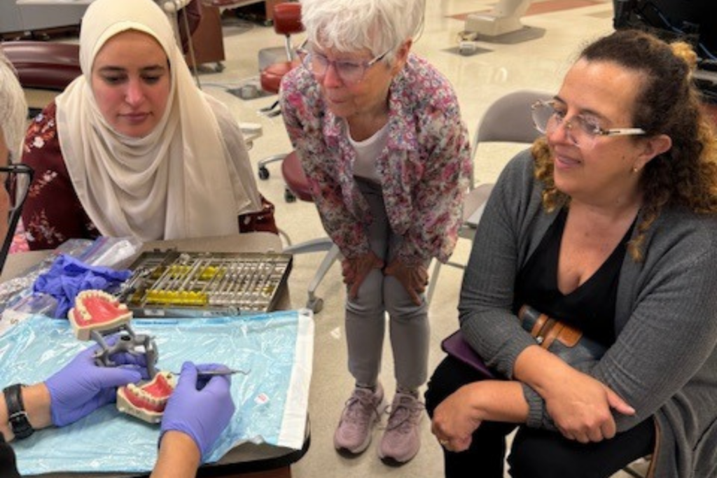 Geriatric Dentistry students learning from faculty.