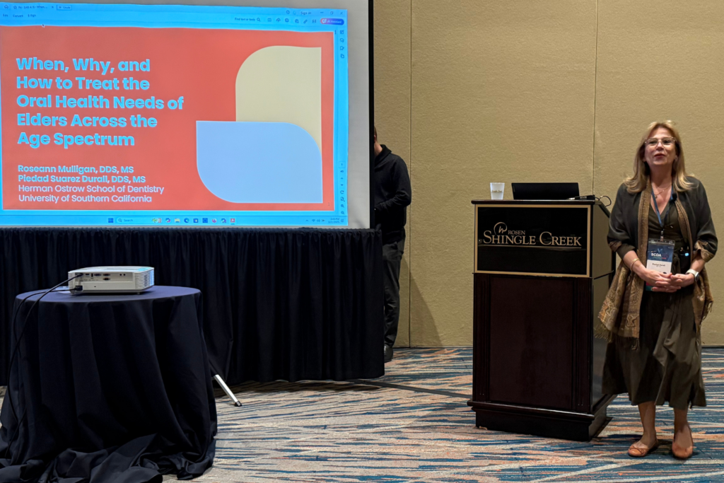 Dr. Piedad Suarez Durall presenting on behalf of Herman Ostrow School of Dentistry for the Geriatric Dentistry Program.